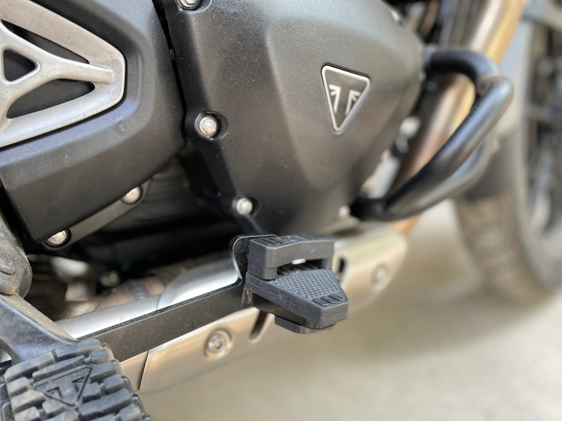 Close-up of EB 600 rear brake extender on Triumph Scrambler 400 X