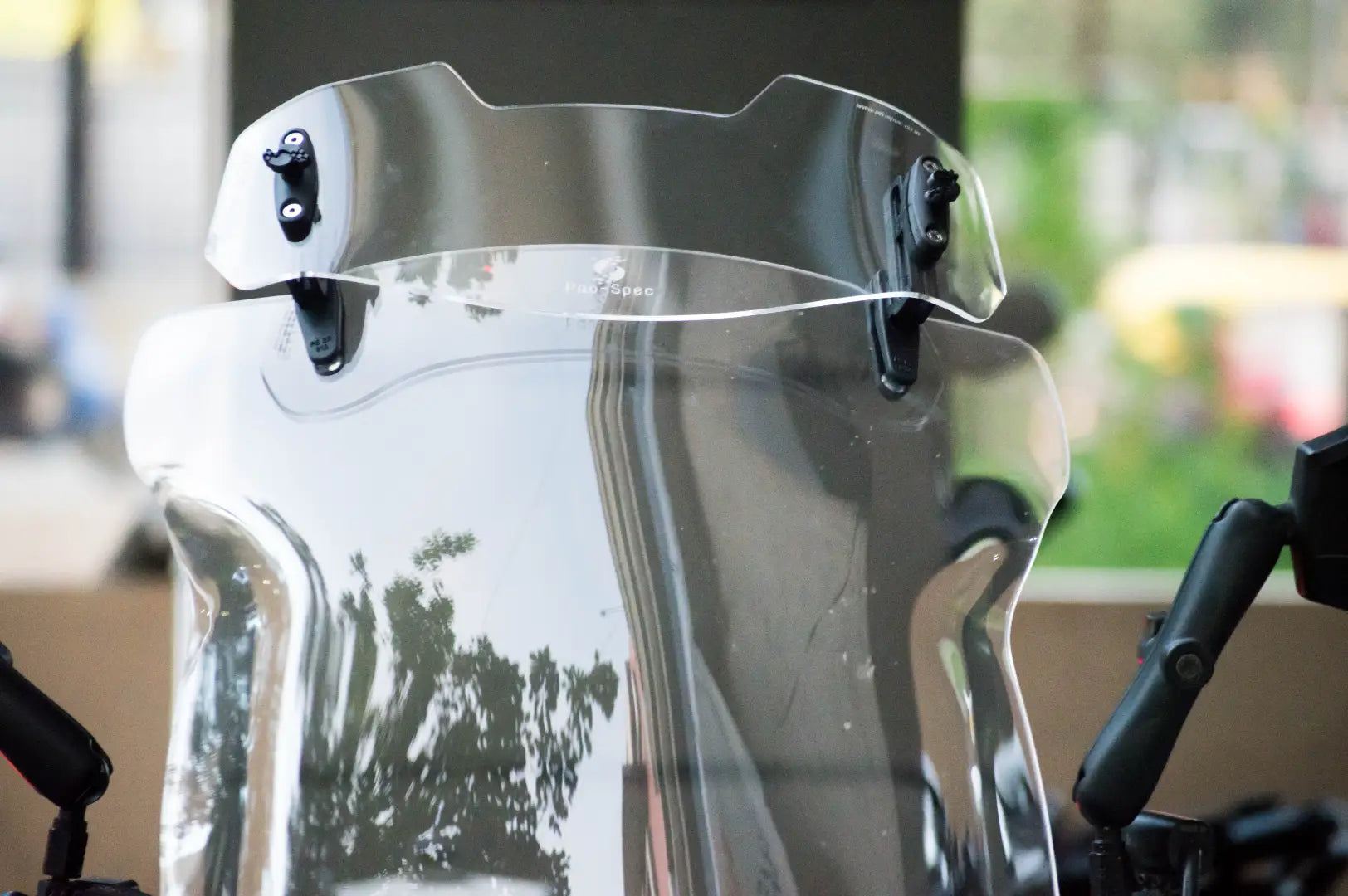 ER 760 motorcycle windshield extender installed on adventure bike